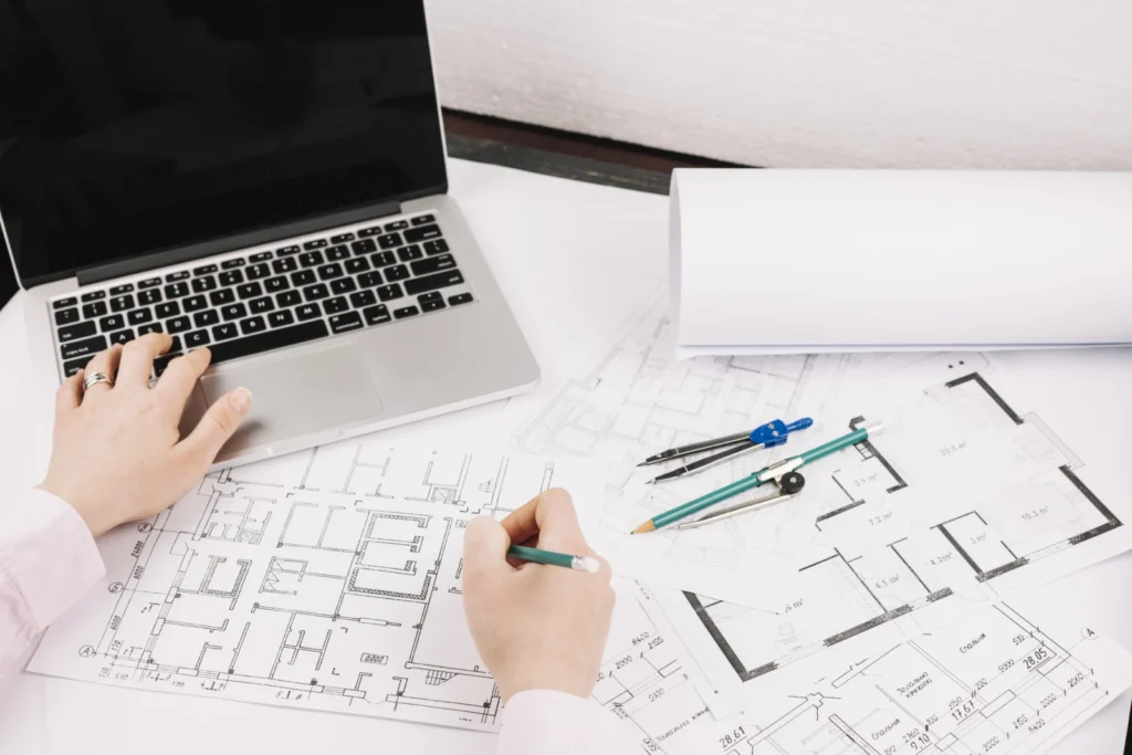 Illustrative set of architectural construction sheets including floor plans, elevations and sections